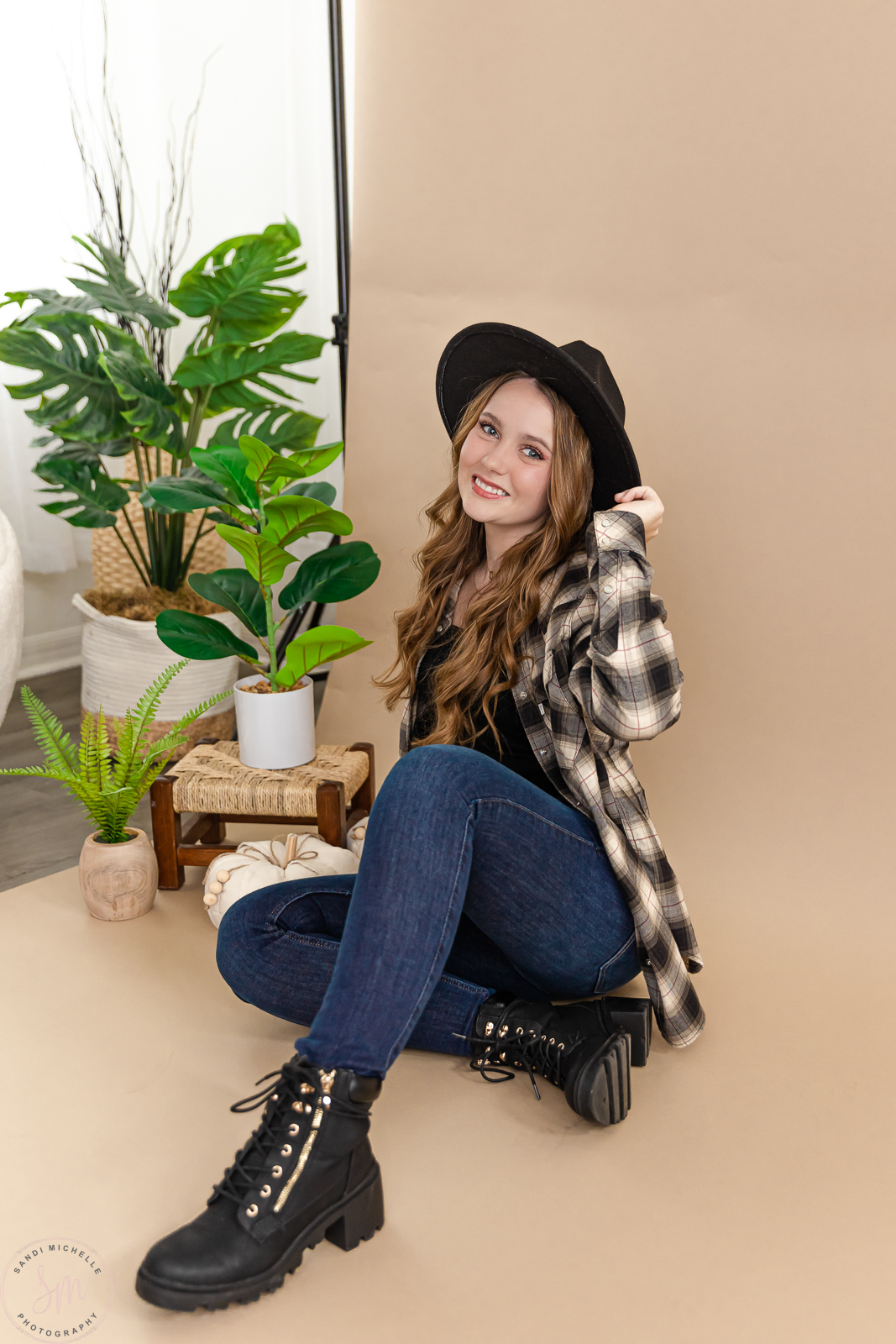 Makenna with her cute boots, hat, and flannel! Her outfit was on point for our fall shoot. 